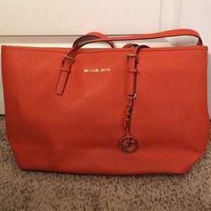 Large Micheal Kors bag. Can fit a 13 in laptop